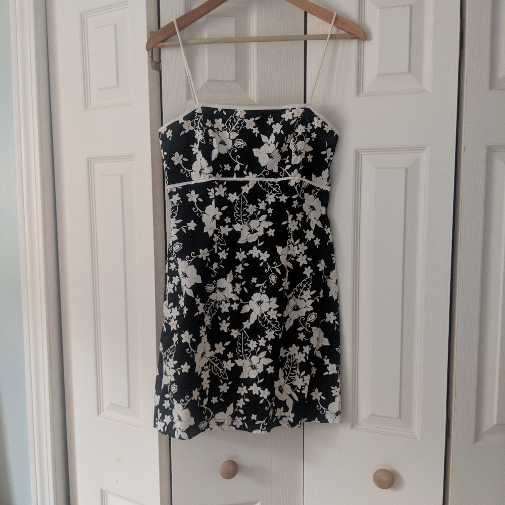 Form fitting black dress with white flowers